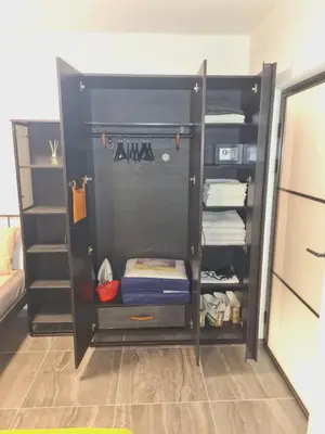 a black closet with towels and towels at Runaway Hill in Bežanija
