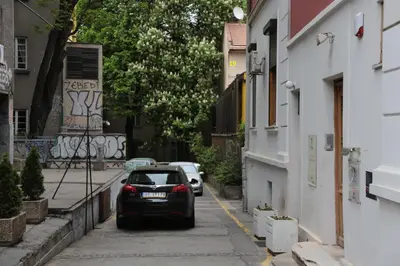 a car parked on the side of a street at Atelier 1 Apartment in Belgrade