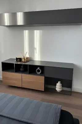 a living room with a black and brown entertainment center at Best View Belgrade Waterfront in Belgrade
