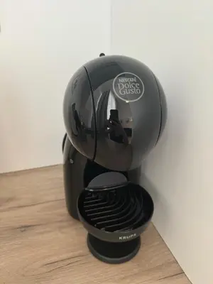 a coffee maker is sitting on a table at Mina Luxury Suite 1 in Belgrade