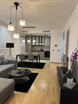 a living room with a couch and a table at LL65 Apartments Novi Dorcol in Belgrade