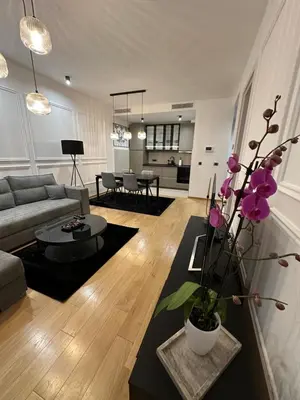 a living room with a couch and a table at LL65 Apartments Novi Dorcol in Belgrade