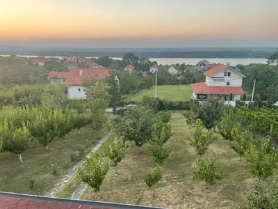 an aerial view of a farm with trees and a house at Vila Plavinac in Smederevo