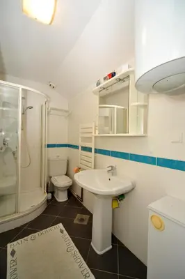 a bathroom with a sink and a toilet at Apartment Resavska in Belgrade