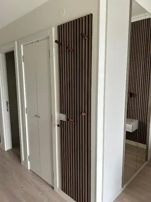 a room with two doors and a mirror at Belgrade Waterfront-Beograd na vodi Galaxy Apartment in Belgrade