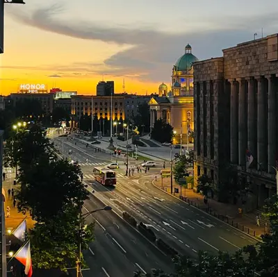 a view of a city with a street at sunset at St. Mark in Belgrade