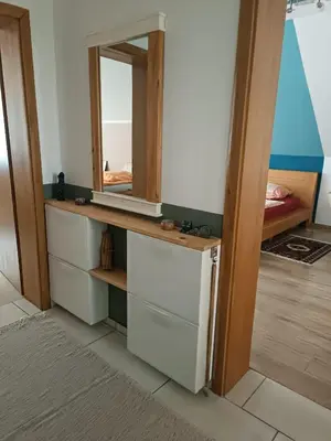 a room with a mirror and some drawers at Jablanicki Refugium in Pružatovac