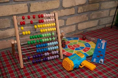 a table with a toy and an abacus at Carska oaza in Lukino Selo