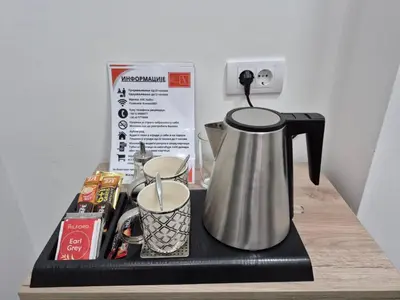 a tea kettle on top of a counter at Authentic Belgrade Centre - 4 Suites in One Space, with patios in courtyard for smokers in Belgrade