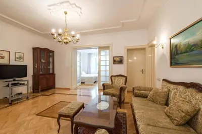 a living room with a couch and a table at Central Belgrade Apartment 2 in Belgrade