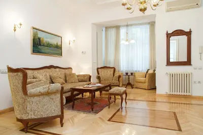 a living room with a couch and a table at Central Belgrade Apartment 2 in Belgrade