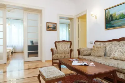 a living room with a couch and chairs and a table at Central Belgrade Apartment 2 in Belgrade