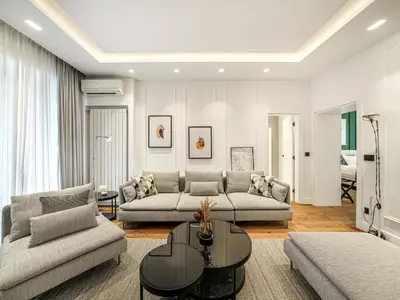 a living room with a couch and a table at Enjoy B-52 Crown in Belgrade