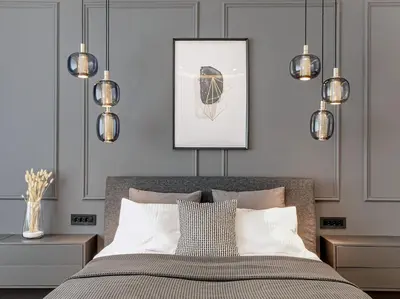 a bedroom with a bed and pendant lights at Enjoy B-52 Crown in Belgrade