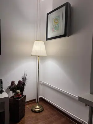 a lamp in a room with a white wall at Kalemegdan centar in Belgrade
