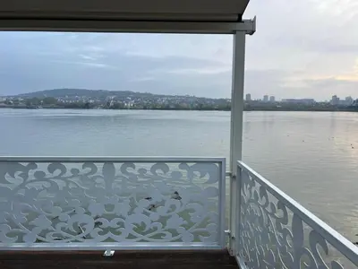 a balcony with a view of the water at Belgrade River House in Belgrade