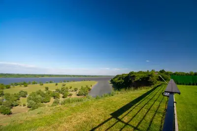 a view of a river from a hill with a view at Vila Julija in Surduk