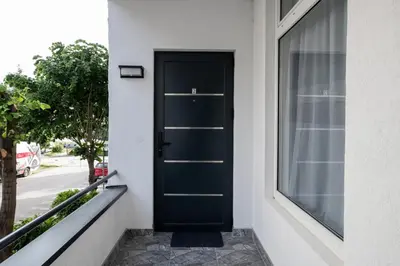 a black door on the side of a building at Belgrade Apartment Nook in Belgrade