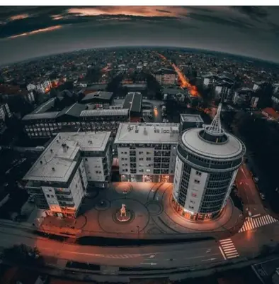 an aerial view of a city at night at Maja lux in Ruma