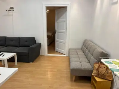 a living room with two couches and a table at Life & Work in Belgrade Centre with FREE parking! in Belgrade