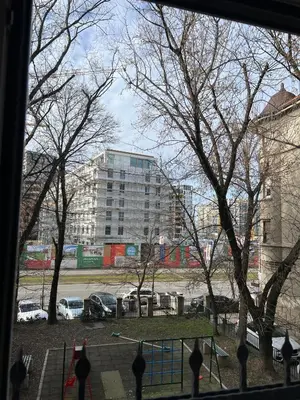 a view from a window of a parking lot with trees at Life & Work in Belgrade Centre with FREE parking! in Belgrade