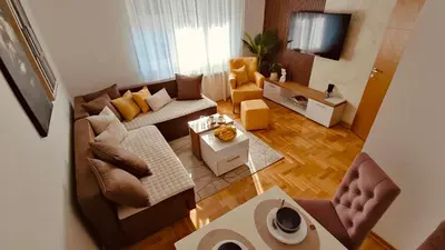an overhead view of a living room with a couch and chairs at Medison in Belgrade