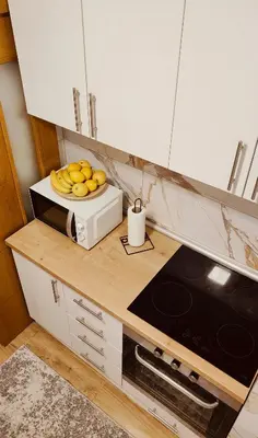 a kitchen with a plate of bananas on a counter at Medison in Belgrade