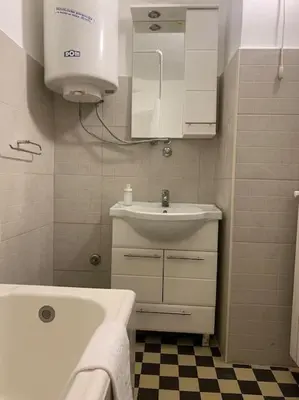 a bathroom with a sink and a bath tub at Belgrade Star with Free parking in Belgrade
