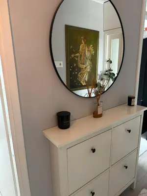 a mirror above a dresser in a room at Ada View in Belgrade
