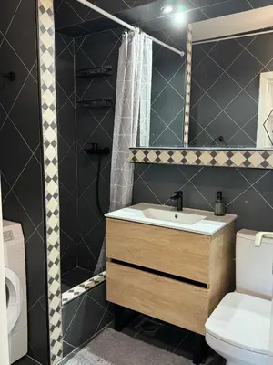a bathroom with a sink and a toilet at Ada View in Belgrade