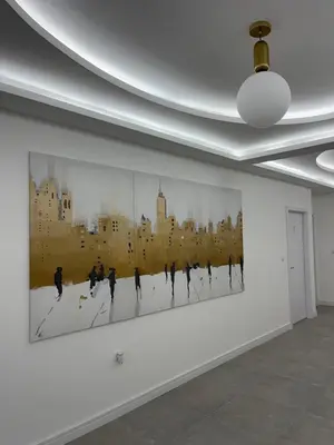 a painting of people on skis on a wall at BeoAir apartments in Surčin