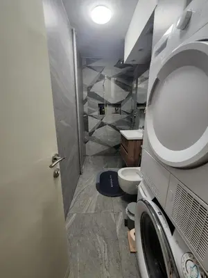a bathroom with a toilet and a sink at AirCity Apartment in Belgrade
