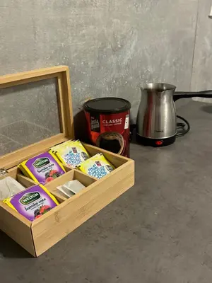 a wooden box filled with different types of butter at 89 rooms in Belgrade