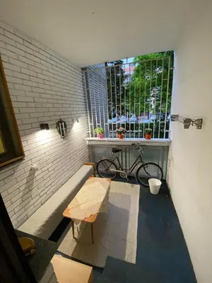 a small room with a bench and a window at Stay4day in Kijevo