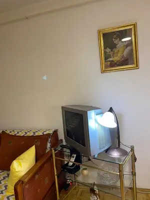a television sitting on a table in a room at Stay4day in Kijevo