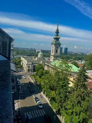 a view of a building with a clock tower at MaKi apartment in Belgrade