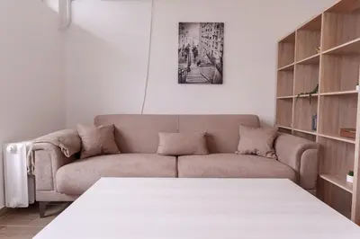 a living room with a couch and a table at MaKi apartment in Belgrade