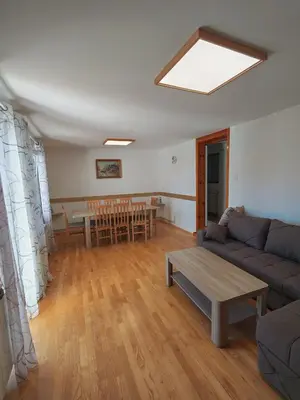a living room with a couch and a table at LipaHill SPA in Ripanj