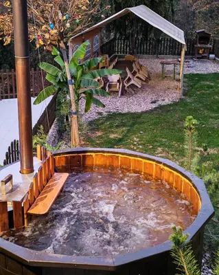 a large pool of water in a backyard at LipaHill SPA in Ripanj
