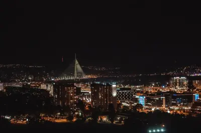 a view of a city at night at Belgrade City Escape - Genex in Belgrade