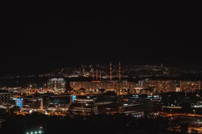 a view of a city at night with lights at Belgrade City Escape - Genex in Belgrade
