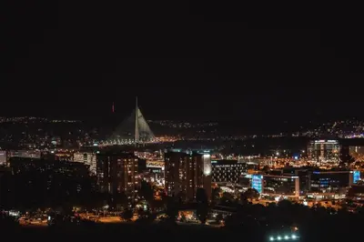 a view of a city at night at Belgrade City Escape - Genex in Belgrade