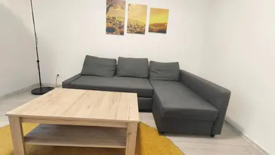 a living room with a couch and a coffee table at B sweet home S in Belgrade