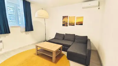 a living room with a couch and a table at B sweet home S in Belgrade