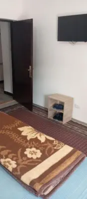 a room with a door and a rug on the floor at Airport MD Apartment in Belgrade