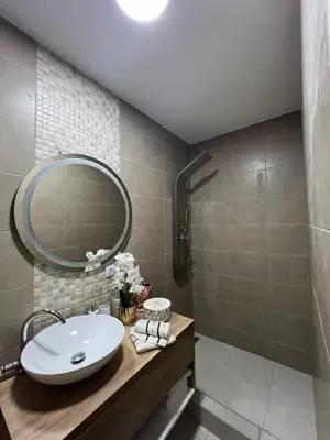a bathroom with a sink and a mirror at Stan na dan, Beograd-Žarkovo in Žarkovo