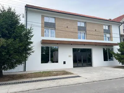 a rendering of a house with a garage at Sremsky inn in Stara Pazova