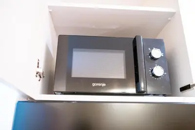 a small appliance sitting on a shelf at Andrej Lux in Jajinci