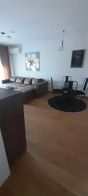 a living room with a couch and chairs in it at Elegance in Zemun