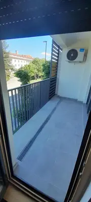 an open door to a balcony with a view at Elegance in Zemun